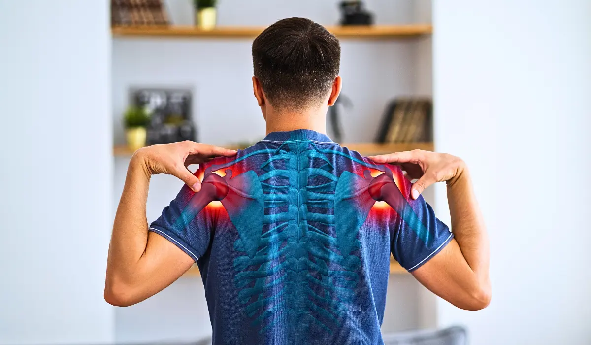 sharp pain between shoulder blades